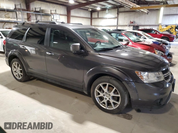 2014 Dodge Journey R/T z VIN 3C4PDDFG5ET310511, wystawiony jako Copart lot #60968954 z przebiegiem 248 796 mil mil oraz Szkoda całkowita • Salvage title. Historia ofert i sprzedaży dostępna na DreamBid. Obrazek 4.