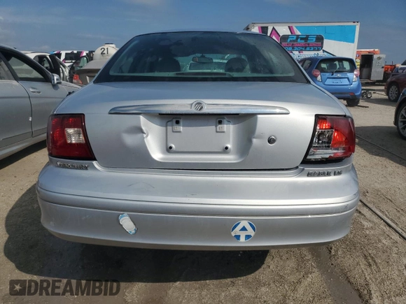2002 Mercury Sable LS z VIN 1MEHM55SX2A619019, wystawiony jako Copart lot #74205254 z przebiegiem 71 677 mil mil oraz Szkody całkowita. Historia ofert i sprzedaży dostępna na DreamBid. Obrazek 6.