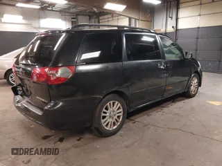 2009 Toyota Sienna XLE with VIN 5TDZK22C19S232024, listed as a IAAI auction lot 42081485 with 179,257 mi miles. Bid and sale history available at carsss.com. Image 4.