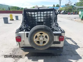 2006 Jeep Wrangler X with VIN 1J4FA39S36P703941, listed as a IAAI auction lot 42220361 with 148,829 mi miles and . Bid and sale history available at DreamBid. Image 16.