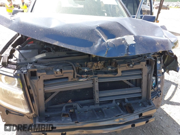 2020 Chevrolet Tahoe LT with VIN 1GNSKBKC6LR239081, listed as a IAAI auction lot 42298842 with 125,328 mi miles and . Bid and sale history available at DreamBid. Image 6.