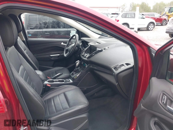 2014 Ford Escape Titanium with VIN 1FMCU9J9XEUD71715, listed as a IAAI auction lot 42127982 with 96,549 mi miles and . Bid and sale history available at DreamBid. Image 5.