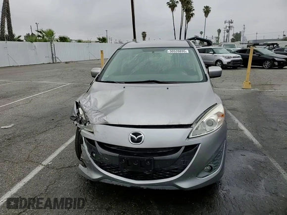 2012 Mazda 5 Touring with VIN JM1CW2CL8C0121599, listed as a Copart auction lot 50520895 with 131,948 mi miles and Salvage title. Bid and sale history available at DreamBid. Image 11.