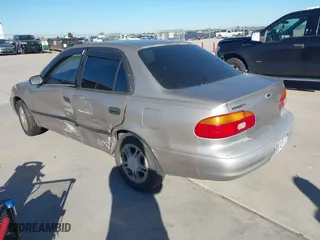 2001 Chevrolet Prizm with VIN 1Y1SK54811Z411948, listed as a IAAI auction lot 40874344 with 1 mi miles. Bid and sale history available at carsss.com. Image 3.