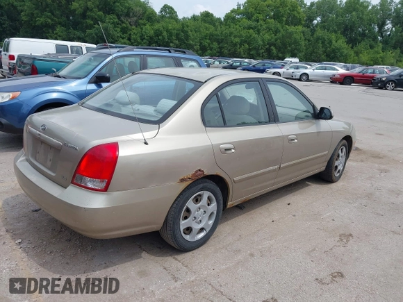 2003 Hyundai Elantra GLS z VIN KMHDN45D73U556305, wystawiony jako IAAI lot #42478211 z przebiegiem 149 648 mil mil oraz . Historia ofert i sprzedaży dostępna na DreamBid. Obrazek 4.