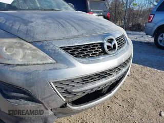 2010 Mazda CX-9 Grand Touring z VIN JM3TB3MA7A0222135, wystawiony jako IAAI lot #41321999 z przebiegiem Nie podano mil oraz . Historia ofert i sprzedaży dostępna na DreamBid. Obrazek 12.