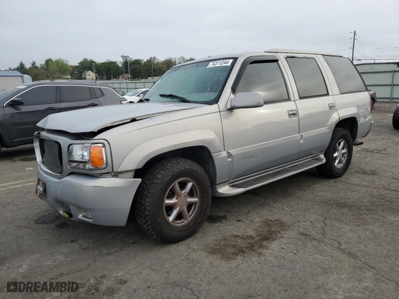 2000 GMC Denali with VIN 1GKEK13RXYR110436, listed as a Copart auction lot 74311244 with 250,735 mi miles and Salvage Title. Bid and sale history available at carsss.com. Image 1.