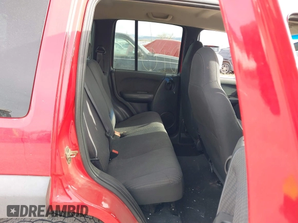 2002 Jeep Liberty Sport with VIN 1J4GL48K82W279730, listed as a IAAI auction lot 40903674 with 133,082 mi miles. Bid and sale history available at carsss.com. Image 8.