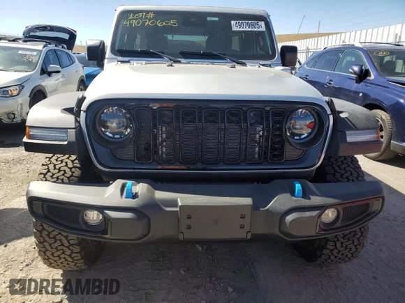 2024 Jeep Wrangler Willys z VIN 1C4RJXN6XRW203949, wystawiony jako Copart lot #49070605 z przebiegiem 10 907 mil mil oraz Czysty tytuł • Clean title. Historia ofert i sprzedaży dostępna na DreamBid. Obrazek 5.