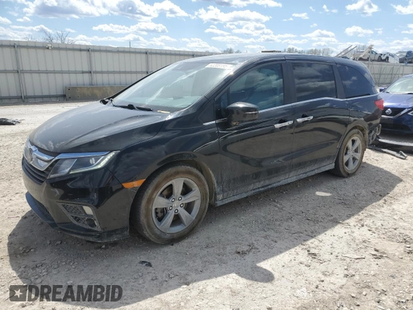 2018 Honda Odyssey EX-L with VIN 5FNRL6H77JB009851, listed as a Copart auction lot 52203155 with 127,575 mi miles and Salvage Title. Bid and sale history available at carsss.com. Image 1.