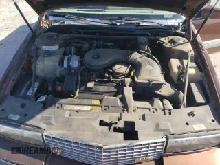 1988 Cadillac Eldorado z VIN 1G6EL115XJU611177, wystawiony jako Copart lot #46526855 z przebiegiem 122 780 mil mil oraz Szkody całkowita. Historia ofert i sprzedaży dostępna na DreamBid. Obrazek 11.