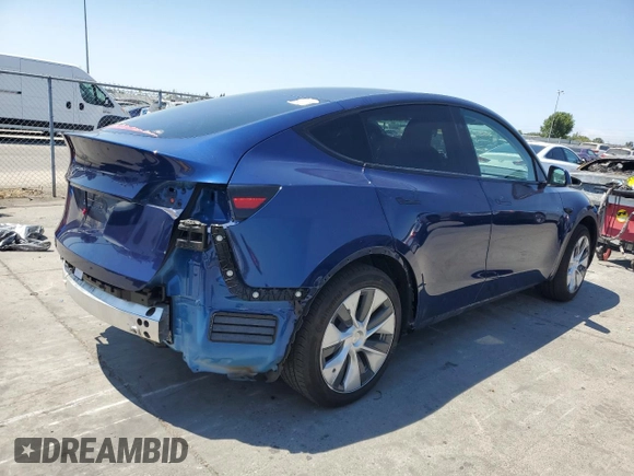 2024 Tesla Model Y z VIN 7SAYGDED9RF005104, wystawiony jako Copart lot #64974545 z przebiegiem 20 422 mil mil oraz Szkoda całkowita • Salvage title. Historia ofert i sprzedaży dostępna na DreamBid. Obrazek 3.