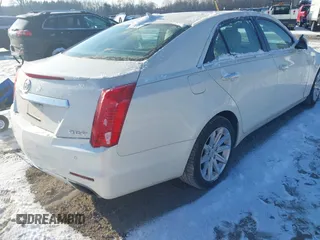 2014 Cadillac CTS Luxury RWD with VIN 1G6AR5SXXE0141931, listed as a IAAI auction lot 41352385 with 162,612 mi miles. Bid and sale history available at carsss.com. Image 4.