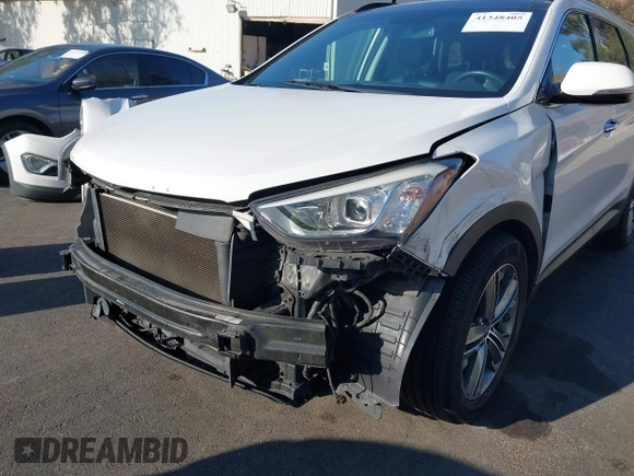 2016 Hyundai Santa Fe SE with VIN KM8SR4HF1GU141799, listed as a IAAI auction lot 41348405 with 99,884 mi miles. Bid and sale history available at carsss.com. Image 18.