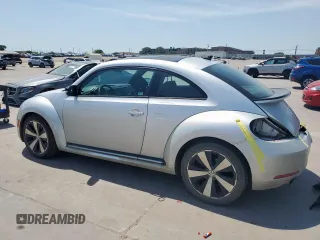 2012 Volkswagen Beetle with VIN 3VWV87AT7CM610251, listed as a Copart auction lot 52852395 with 77,550 mi miles and Salvage Title. Bid and sale history available at DreamBid. Image 2.
