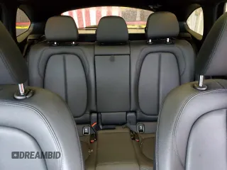 2021 BMW X1 sDrive28i z VIN WBXJG7C04M5S68209, wystawiony jako Copart lot #52099115 z przebiegiem 57 497 mil mil oraz Szkody całkowita. Historia ofert i sprzedaży dostępna na DreamBid. Obrazek 10.