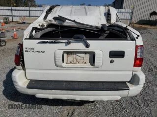 2004 Isuzu Rodeo S with VIN 4S2DM58W144310706, listed as a Copart auction lot 74980644 with 155,262 mi miles and Salvage Title. Bid and sale history available at DreamBid. Image 6.