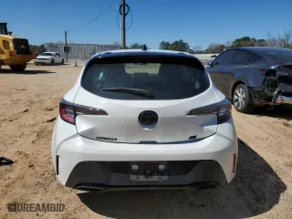2021 Toyota Corolla Hatchback SE with VIN JTND4MBE4M3132376, listed as a Copart auction lot 47357005 with 104,713 mi miles and Salvage Title. Bid and sale history available at carsss.com. Image 6.