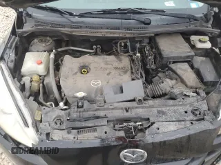 2012 Mazda 5 Sport z VIN JM1CW2BL0C0142657, wystawiony jako Copart lot #85156244 z przebiegiem 107 628 mil mil oraz Szkoda całkowita • Salvage title. Historia ofert i sprzedaży dostępna na DreamBid. Obrazek 11.