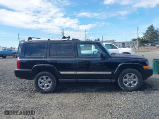 2006 Jeep Commander Limited with VIN 1J8HG58256C173210, listed as a IAAI auction lot 41809396 with 214,864 mi miles. Bid and sale history available at carsss.com. Image 13.