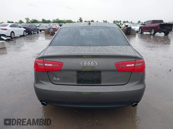 2014 Audi A6 Premium Plus z VIN WAUGFAFC3EN087176, wystawiony jako IAAI lot #42117602 z przebiegiem 53 571 mil mil oraz . Historia ofert i sprzedaży dostępna na DreamBid. Obrazek 17.