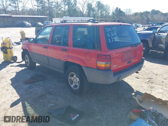 1996 Jeep Grand Cherokee Laredo with VIN 1J4EX58S8TC122302, listed as a IAAI auction lot 41218573 with 195,392 mi miles. Bid and sale history available at carsss.com. Image 3.