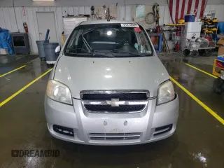 2011 Chevrolet Aveo 1LT z VIN KL1TD5DE6BB154327, wystawiony jako Copart lot #51313085 z przebiegiem 76 402 mil mil oraz Szkoda całkowita • Salvage title. Historia ofert i sprzedaży dostępna na DreamBid. Obrazek 5.