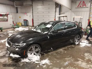 2021 BMW 3 Series 330i xDrive with VIN 3MW5R7J02M8C21465, listed as a IAAI auction lot 38490636 with 37,391 mi miles. Bid and sale history available at carsss.com. Image 2.