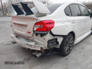 2015 Subaru WRX with VIN JF1VA1A67F9819707, listed as a IAAI auction lot 42021831 with 104,706 mi miles. Bid and sale history available at carsss.com. Image 6.