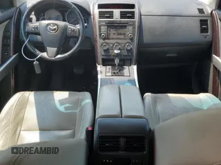 2015 Mazda CX-9 Grand Touring with VIN JM3TB2DA9F0468539, listed as a Copart auction lot 60829905 with 223,483 mi miles and Clean title. Bid and sale history available at DreamBid. Image 8.