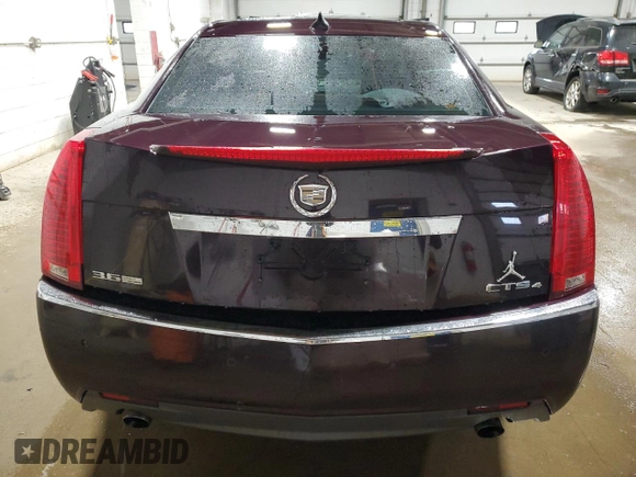 2009 Cadillac CTS AWD z VIN 1G6DT57V990136974, wystawiony jako Copart lot #50154525 z przebiegiem 196 934 mil mil oraz Szkoda całkowita • Salvage title. Historia ofert i sprzedaży dostępna na DreamBid. Obrazek 6.