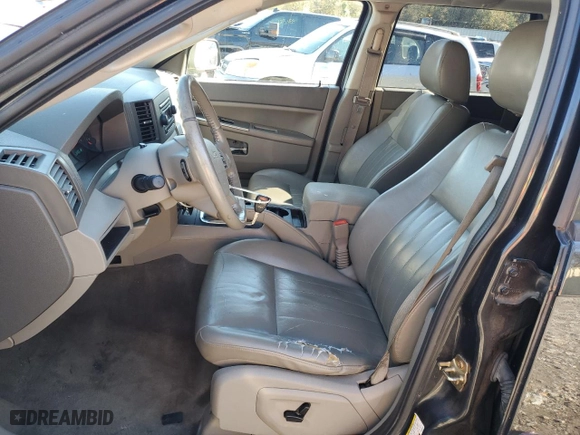 2005 Jeep Grand Cherokee Laredo with VIN 1J4HS48N05C566325, listed as a Copart auction lot 84743394 with 160,840 mi miles and Salvage Title. Bid and sale history available at carsss.com. Image 7.
