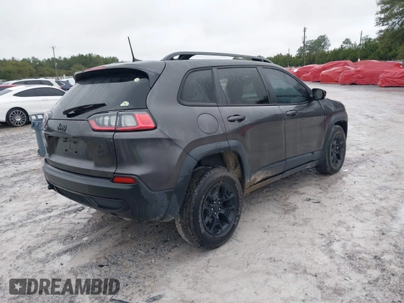 2022 Jeep Cherokee X with VIN 1C4PJMCX0ND538919, listed as a IAAI auction lot 41321416 with 65,577 mi miles. Bid and sale history available at carsss.com. Image 4.