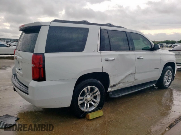 2016 Chevrolet Tahoe LT with VIN 1GNSCBKC2GR475679, listed as a Copart auction lot 54987195 with 130,387 mi miles and Salvage title. Bid and sale history available at DreamBid. Image 3.