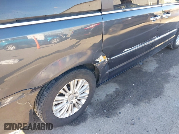2014 Chrysler Town & Country Limited with VIN 2C4RC1GGXER176316, listed as a IAAI auction lot 41423119 with 150,109 mi miles and . Bid and sale history available at DreamBid. Image 6.
