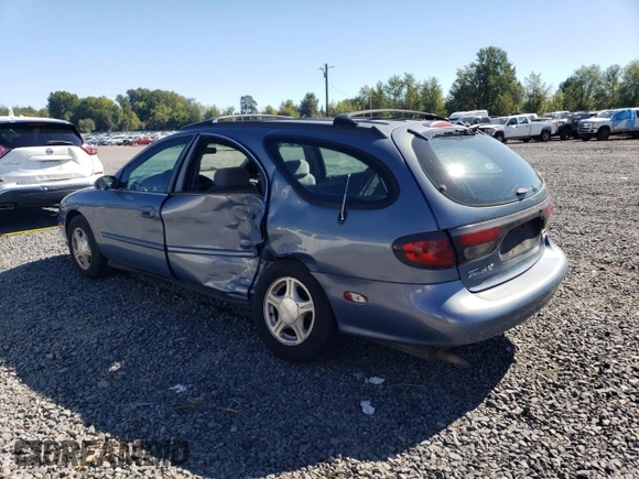 1999 Ford Taurus SE Standard with VIN 1FAFP58U9XG271897, listed as a Copart auction lot 73048784 with 190,518 mi miles and Salvage title. Bid and sale history available at DreamBid. Image 2.