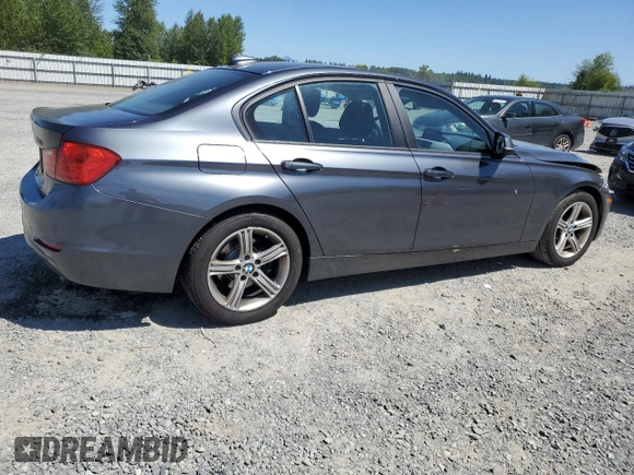 2014 BMW 3 Series 320i with VIN WBA3B1C54EK132952, listed as a Copart auction lot 63653435 with 63,260 mi miles and Salvage title. Bid and sale history available at DreamBid. Image 3.