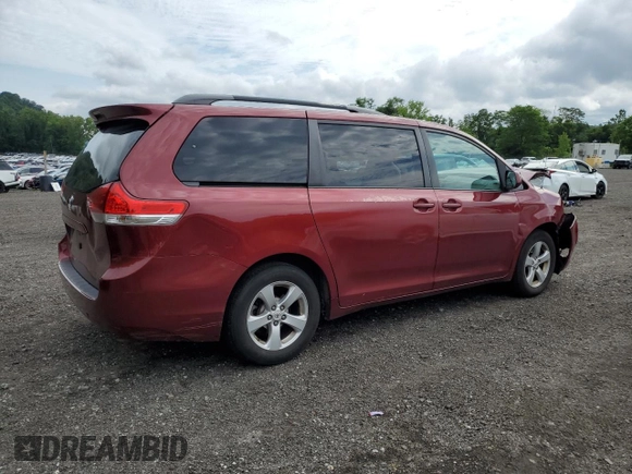2012 Toyota Sienna LE AAS with VIN 5TDKK3DC4CS253719, listed as a Copart auction lot 63990175 with 155,561 mi miles and Salvage title. Bid and sale history available at DreamBid. Image 3.