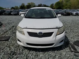 2009 Toyota Corolla with VIN 1NXBU40E49Z055200, listed as a Copart auction lot 52759435 with 186,806 mi miles and Salvage Title. Bid and sale history available at carsss.com. Image 5.