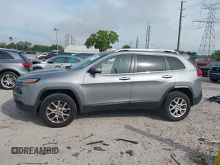 2014 Jeep Cherokee Altitude with VIN 1C4PJMCB4EW107556, listed as a IAAI auction lot 41881448 with 212,816 mi miles and . Bid and sale history available at carsss.com. Image 15.