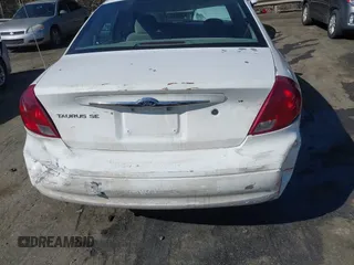 2003 Ford Taurus SE Standard with VIN 1FAFP53293G270314, listed as a IAAI auction lot 41840424 with 171,840 mi miles. Bid and sale history available at carsss.com. Image 6.