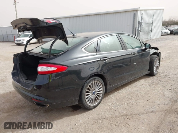 2015 Ford Fusion Titanium with VIN 3FA6P0K99FR268450, listed as a IAAI auction lot 41805513 with 202,009 mi miles. Bid and sale history available at carsss.com. Image 14.
