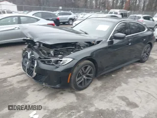 2024 BMW 4 Series 430i xDrive with VIN WBA73AV05RFS35389, listed as a IAAI auction lot 41144465 with 14,661 mi miles. Bid and sale history available at carsss.com. Image 2.