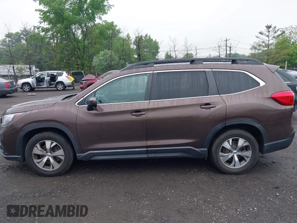 2019 Subaru Ascent Premium with VIN 4S4WMAFD9K3413983, listed as a IAAI auction lot 42257670 with 64,087 mi miles and . Bid and sale history available at DreamBid. Image 14.