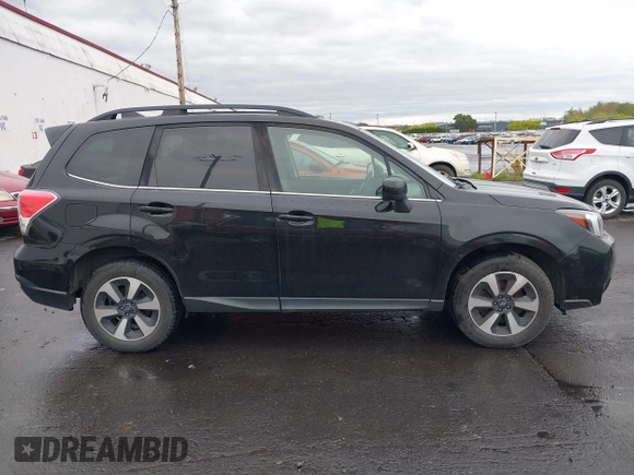 2018 Subaru Forester Premium with VIN JF2SJGEC4JH581718, listed as a IAAI auction lot 41988454 with 76,376 mi miles. Bid and sale history available at carsss.com. Image 13.