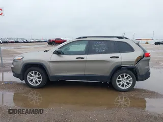 2017 Jeep Cherokee Altitude with VIN 1C4PJLABXHW613975, listed as a IAAI auction lot 42122784 with 101,626 mi miles and . Bid and sale history available at DreamBid. Image 14.