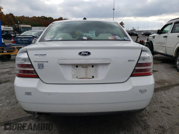 2008 Ford Taurus SEL with VIN 1FAHP24W08G155388, listed as a Copart auction lot 77678344 with 122,610 mi miles and Salvage Title. Bid and sale history available at carsss.com. Image 6.