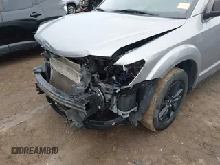 2019 Dodge Journey SE with VIN 3C4PDCBG9KT869149, listed as a IAAI auction lot 41472289 with 97,333 mi miles and . Bid and sale history available at DreamBid. Image 6.