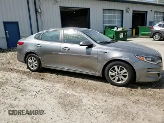 2016 Kia Optima LX z VIN 5XXGT4L3XGG088048, wystawiony jako Copart lot #56802395 z przebiegiem 165 891 mil mil oraz Szkoda całkowita • Salvage title. Historia ofert i sprzedaży dostępna na DreamBid. Obrazek 13.
