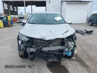 2018 Chevrolet Equinox LT z VIN 2GNAXSEV9J6212976, wystawiony jako IAAI lot #41643246 z przebiegiem 120 814 mil mil oraz . Historia ofert i sprzedaży dostępna na DreamBid. Obrazek 12.